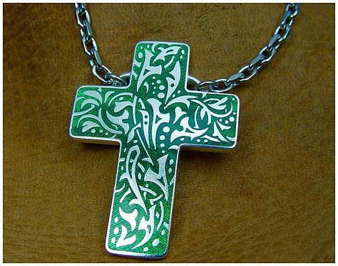 Sterling silver cross with green enamel