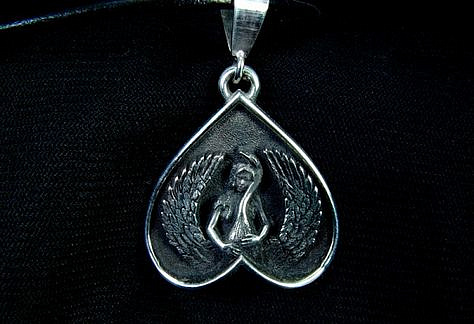 Upside down heart charm. Leda and the swan.