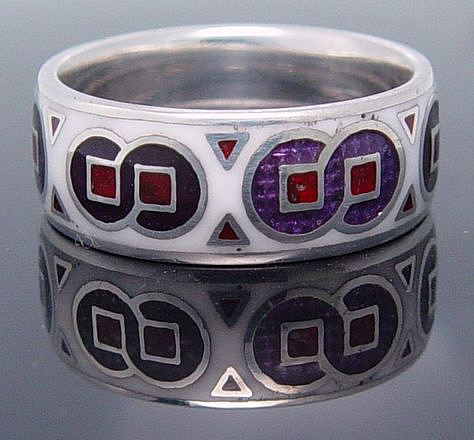 White, red and purple enamel. Silver ring