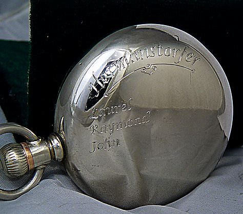 Hand engraved names on pocket watch.
