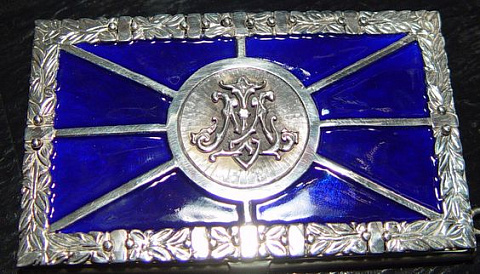 Silver case with hot enamel and hand carved monogram. Custom order and engraving.
